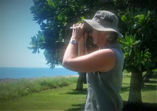 Diana checking out birdlife on the rocks at East Point  (photo copyright Mike Jarvis)